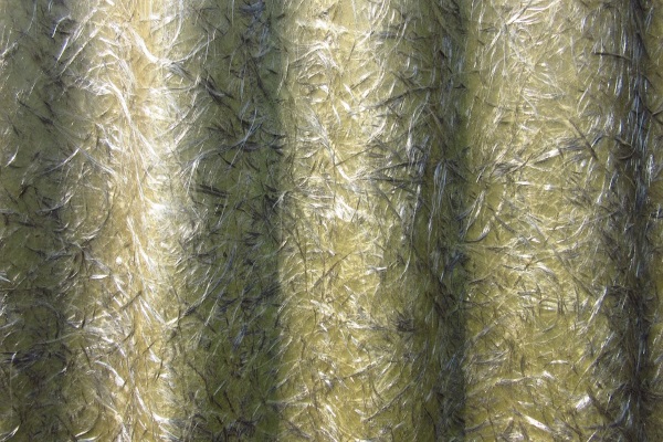 fiberglass shards and hairs in a processing plate