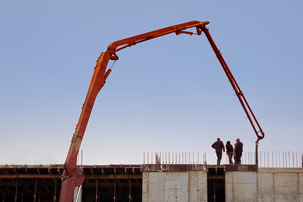 Construction engineers supervising progress of construction 